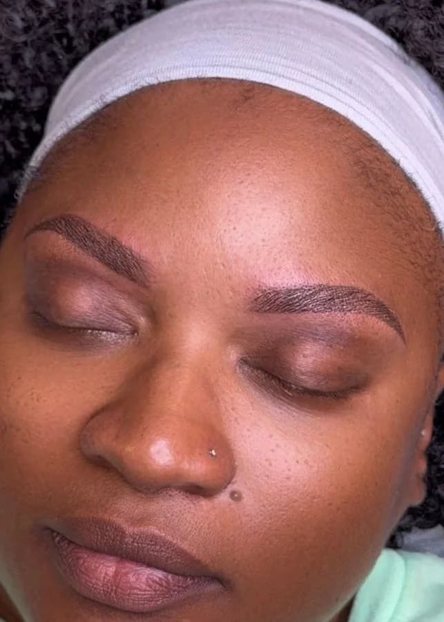 Healed ombré powder brows with a soft gradient from light front to deeper tail, Marietta GA